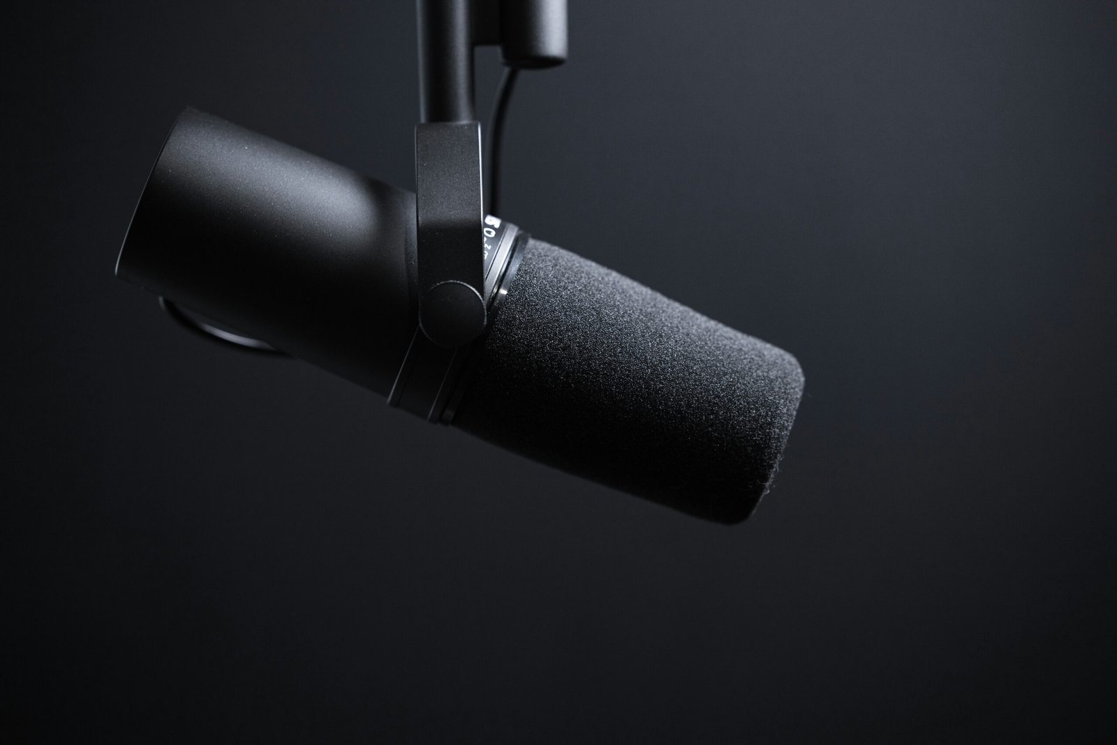A microphone set up for recording at a desk